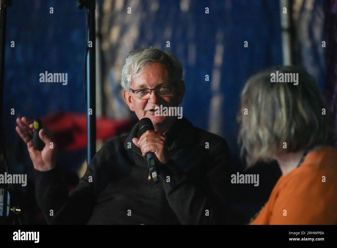 Glanusk Park, UK. Friday, 18 August, 2023. The photographer, Martin Parr on stage at the 2023 Green Man Festival in Glanusk Park, Brecon Beacons, Wales. Photo date: Friday, August 18, 2023. Photo credit should read: Richard Gray/Alamy Live News Stock Photo