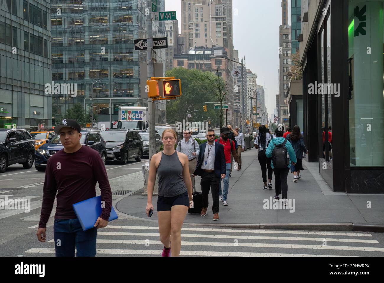 new-york-usa-july-20th-2023-pedestrians-jaywalking-on-a-signaled