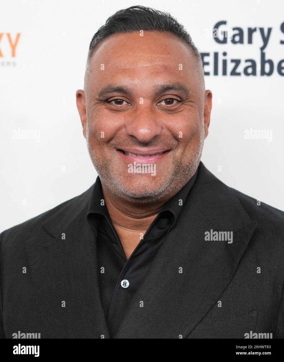 Los Angeles, USA. 18th Aug, 2023. Russell Peters arrives at the 23rd Harold & Carole Pump