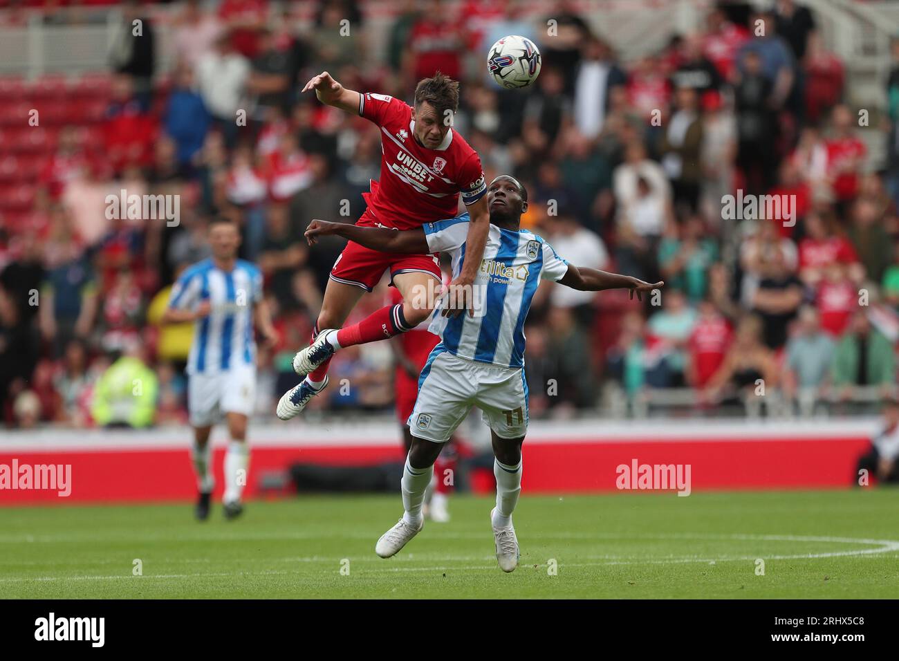 Middlesbrough's Jonathan Howson challenges for a header with Huddersfield Town's Brahima Diarra during the Sky Bet Championship match between Middlesbrough and Huddersfield Town at the Riverside Stadium, Middlesbrough on Saturday 19th August 2023. (Photo: Mark Fletcher | MI News) Credit: MI News & Sport /Alamy Live News Stock Photo