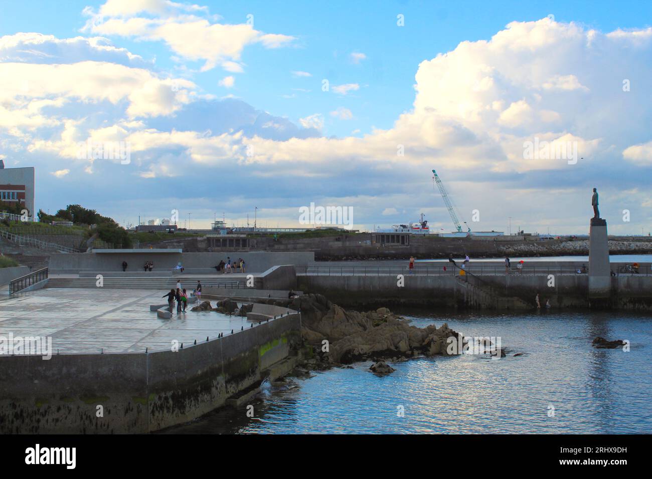 A photo of the Dún Laoghaire baths on a sunny evening. Stock Photo
