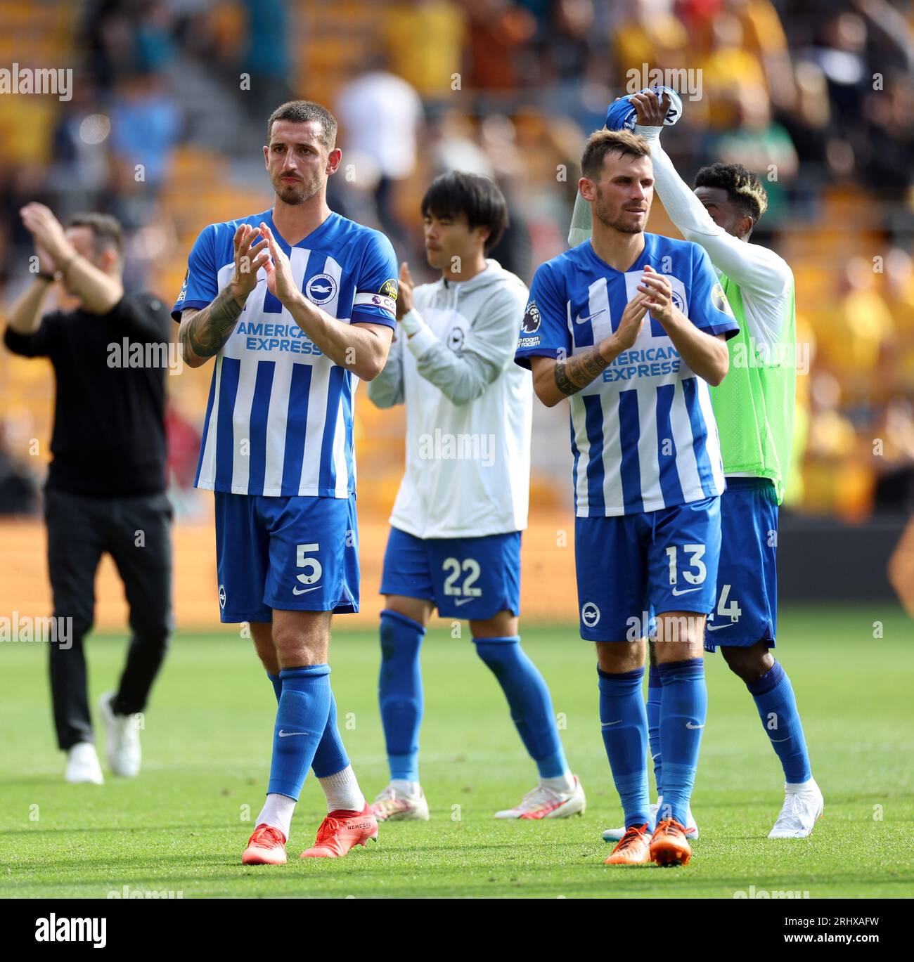 Brighton and Hove Albion's Lewis Dunk and Pascal Gross following the