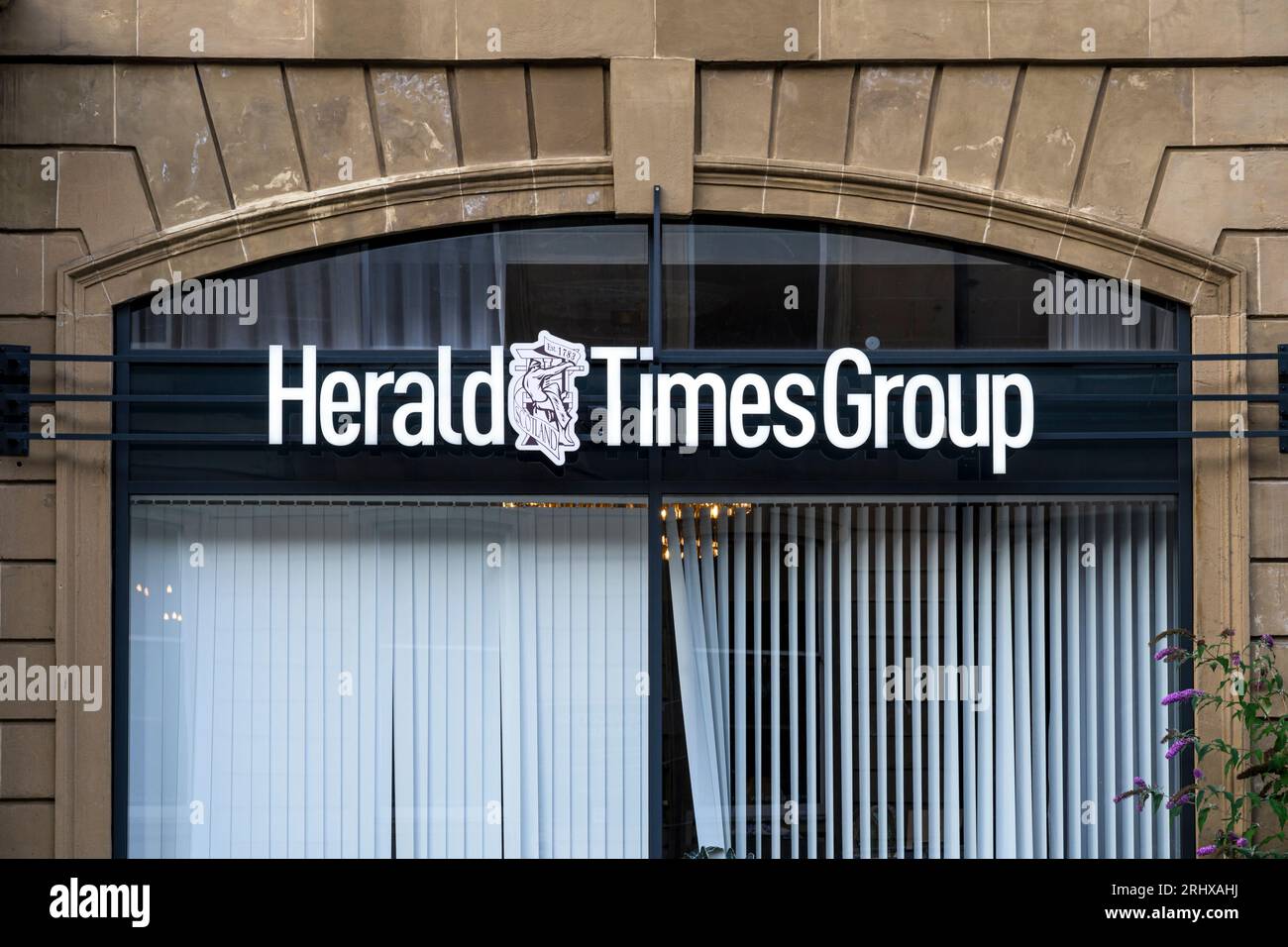 Sign on the offices of the Herald Times Group part of Newsquest Media, Glasgow, Scotland, UK , Europe Stock Photo