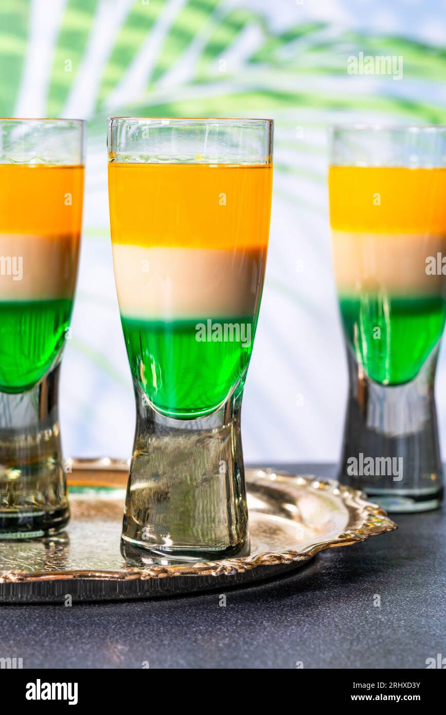 Irish flag shots - traditional St Patricks Day layered alcoholic drinks Stock Photo