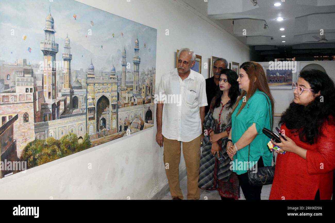 Visitors take keen interest in pictures during Water Painting Art