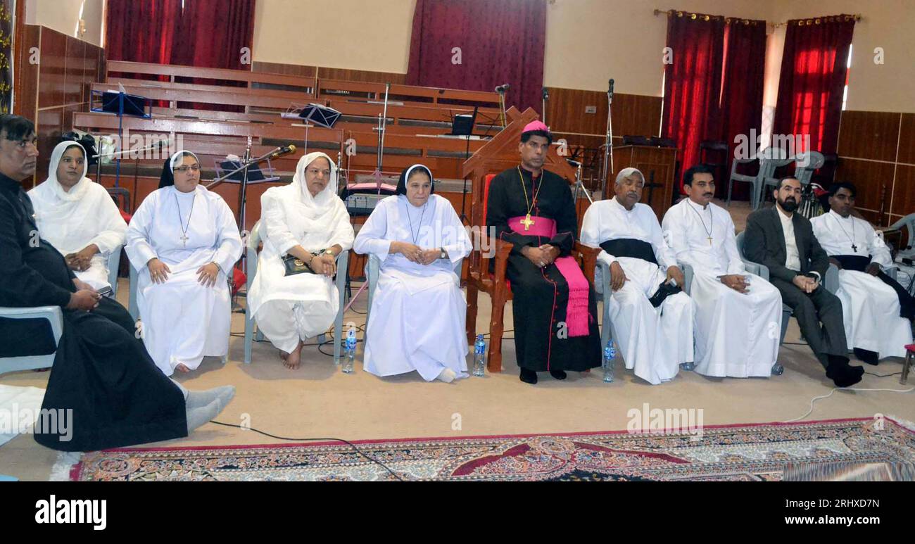 Scholars and religious leaders of different religions and political and social religious leaders of Balochistan sit on stage during condolence conference against attacked on churches in Jaranwala incident organized by Majlis Wahdat-ul-Muslimeen held at Methodist Church in Quetta on Saturday, August 19, 2023. Stock Photo