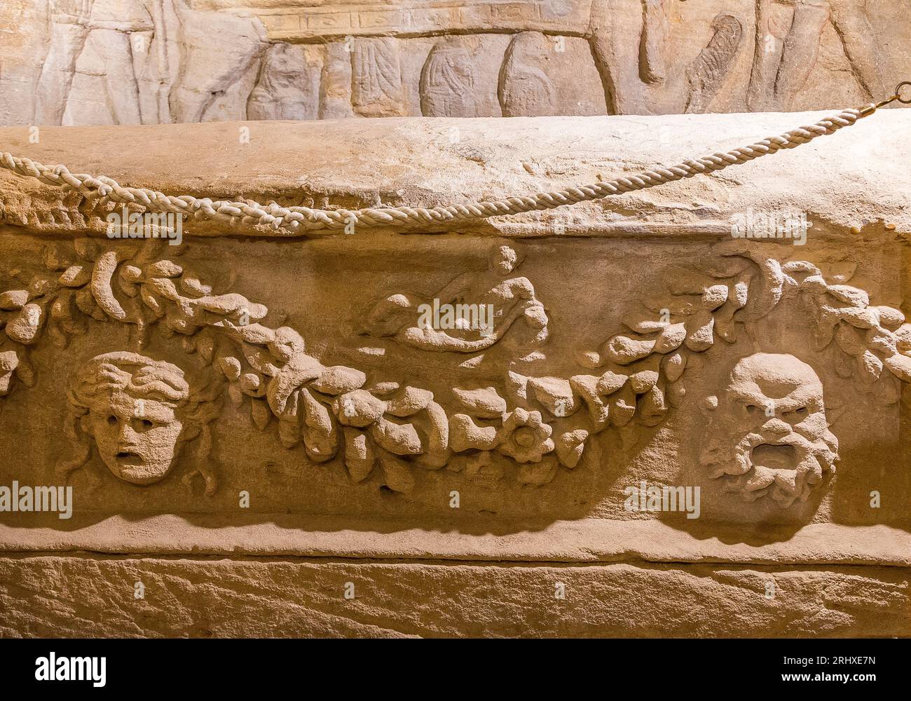 Kom el Shogafa necropolis, main tomb, main room, central niche, general view : Detail of the sarcophagus, Medusa and silenus mask. Stock Photo