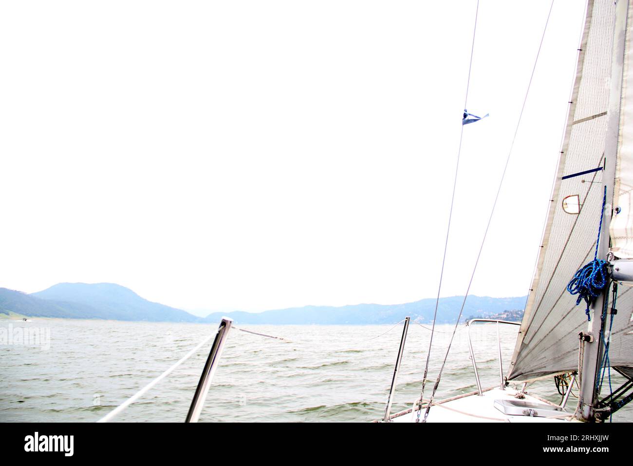 Weather Vane Rudder Parts of a sailboat that is sailing on the lake with sails out, bow ...
