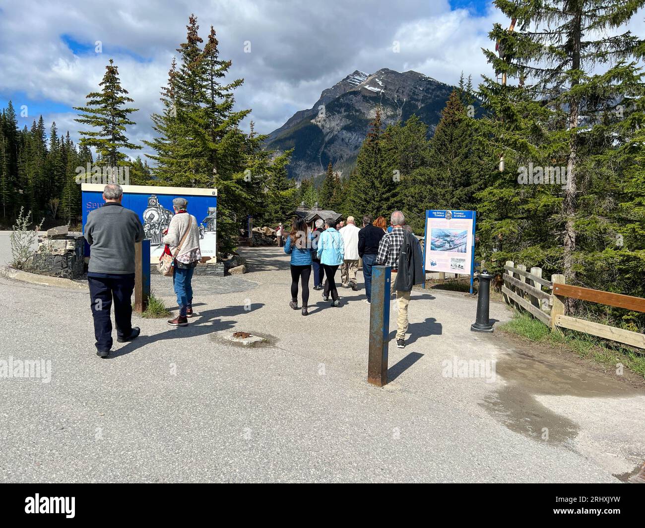 Field, BC Canada May 24, 2023 People reading the sign for the Spiral