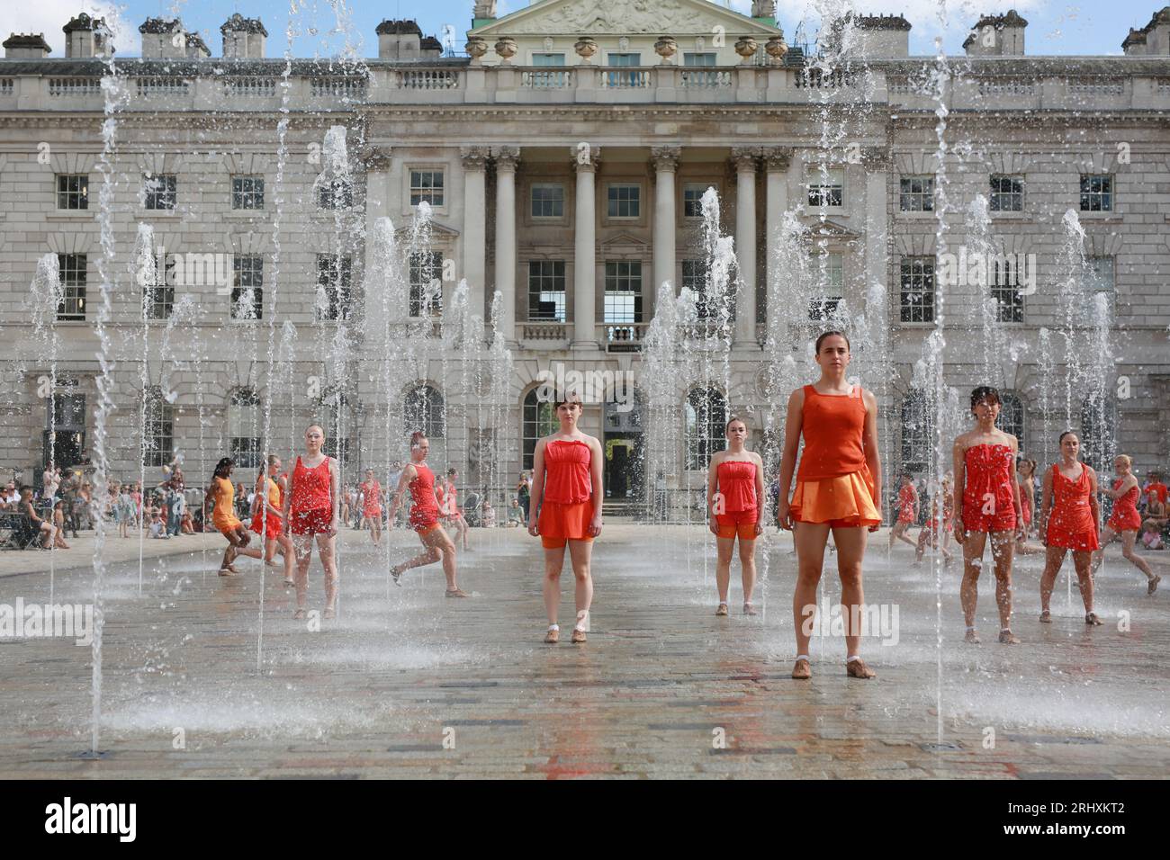 London, UK. 19 August 2023. 'Counterpoint' at Somerset House. A group of 22 women dance a duet with the iconic fountains of Somerset House in 'Counterpoint' created by Shobana Jeyasingh Dance. Performances as part of Westminster City Council's Inside Out Festival. Credit: Waldemar Sikora/Alamy Live News Stock Photo