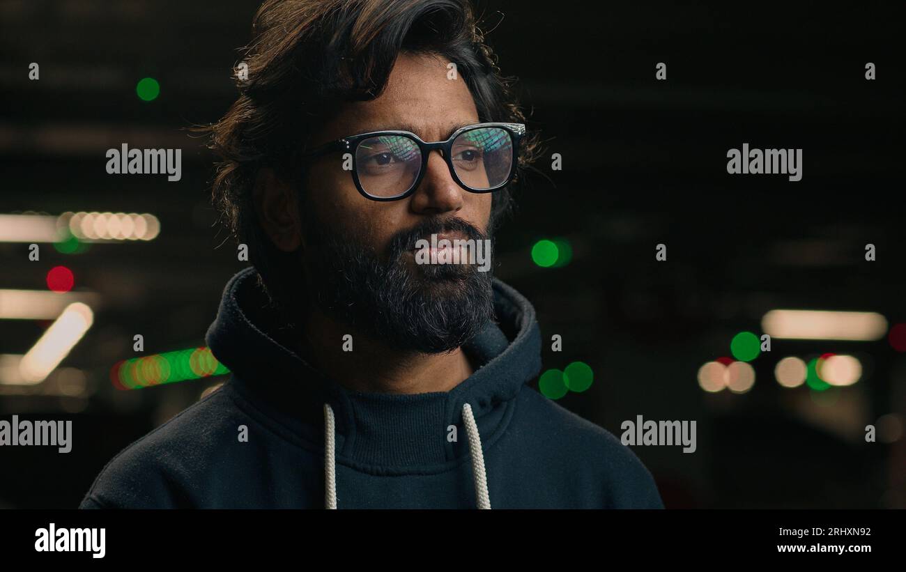 Male portrait outdoors dark night underground parking lot sick unwell