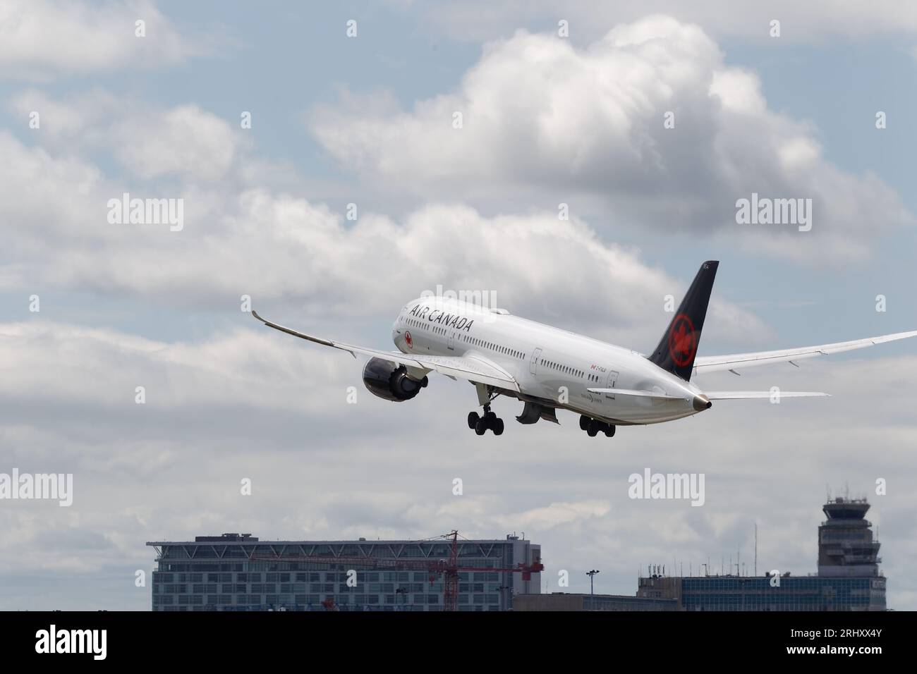 Air Canada's Boeing 787-9 Dreamliner taking off from the Montréal-Pierre Elliott Trudeau International Airport. Dorval, Canada Stock Photo