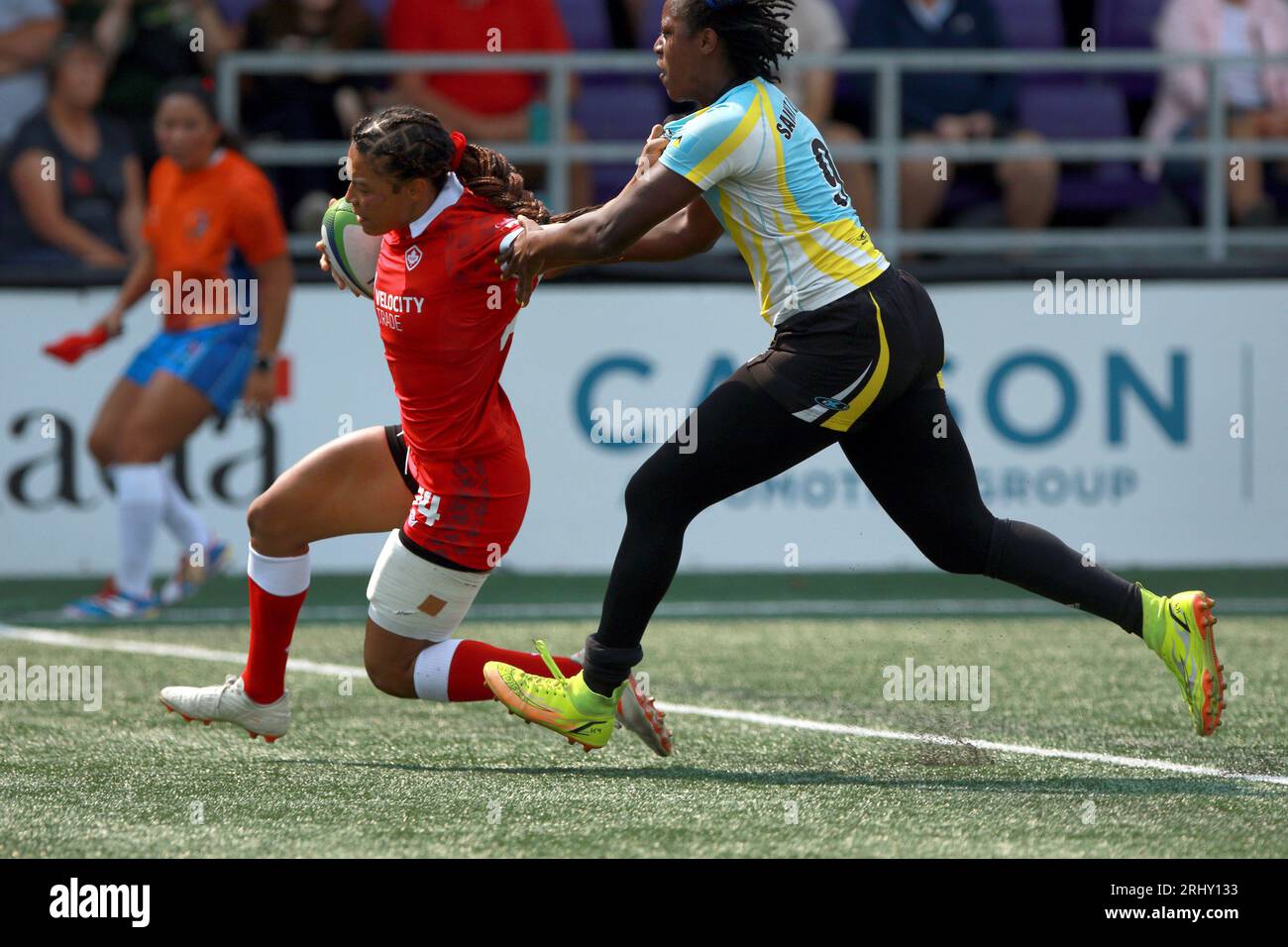 Team Canada's Asia Hogan Rochester, front left, avoids a tackle