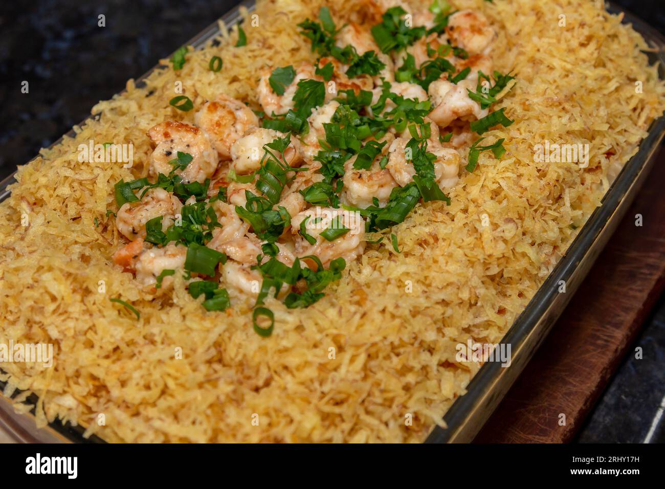 Original Brazilian International Shrimp Recipe in Closeup and Selective Focus. Camarão internacional coco bambu. Brazilian food Stock Photo