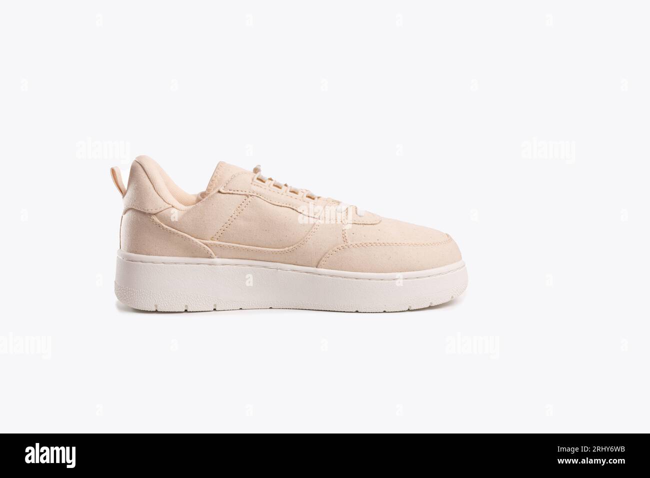 Classic hipster biege sneakers on white background, active lifestyle ...