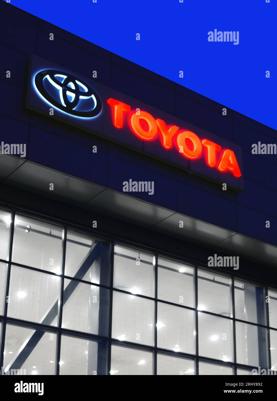 the Toyota neon sign at night on commercial building Stock Photo