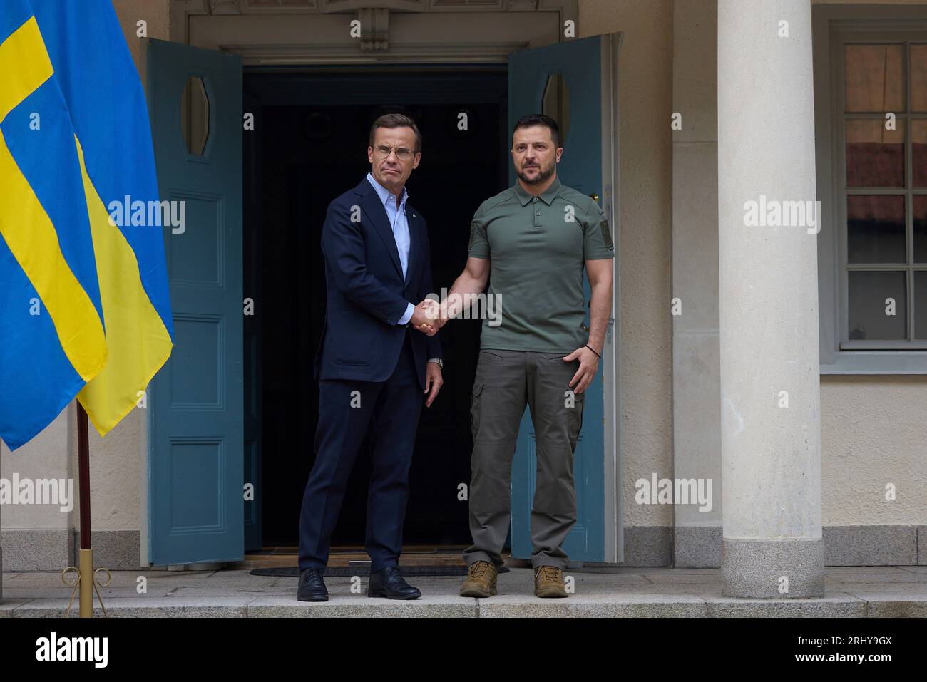 Flen, Sweden. 19th Aug, 2023. Swedish Prime Minister Ulf Kristersson, left, welcomes Ukrainian President Volodymyr Zelenskyy, right, to the historic Harpsund country retreat, August 19, 203 in Flen, Sweden. Credit: Pool Photo/Ukrainian Presidential Press Office/Alamy Live News Stock Photo