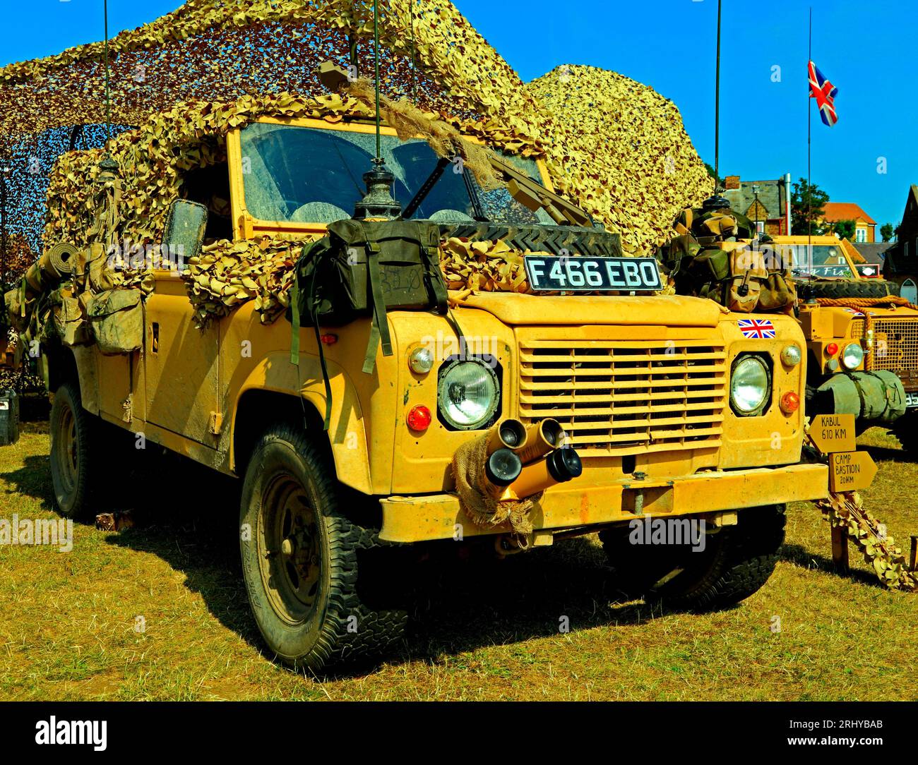 British 1980s Military Vehicle, Jeep, vintage, British Army, camouflage netting, tent Stock Photo