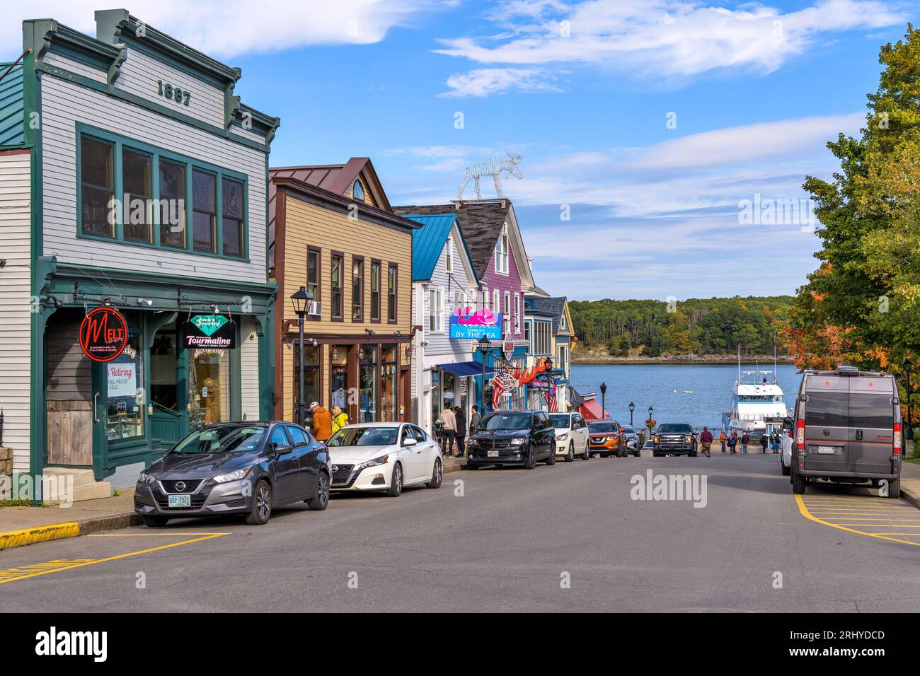 Bar Harbor - A sunny Autumn morning view of the historic Main street of the resort town at shore of Frenchman Bay. Bar Harbor, Maine, USA. Stock Photo
