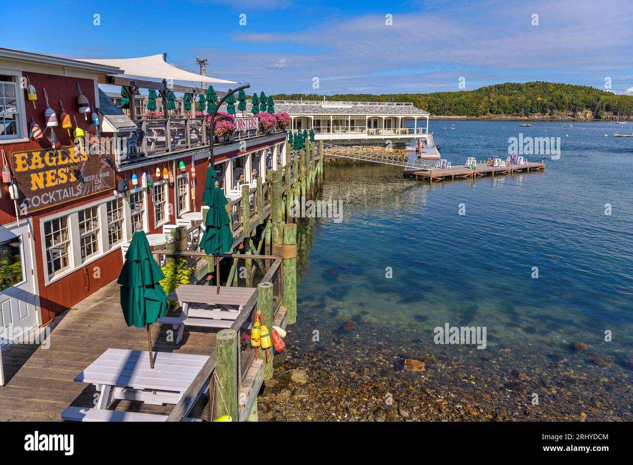 Bar Harbor Pier - A sunny Autumn morning view of a commercial pier at shore of Frenchman Bay. Bar Harbor, Mount Desert Island, Maine, USA. Stock Photo
