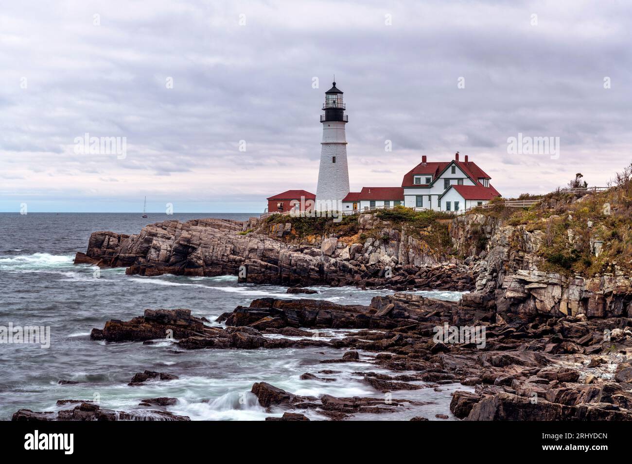 Portland Head Light - A closeup view of the historic Portland Head Lighthouse on a stormy Autumn evening. Cape Elizabeth, Portland, Maine, USA. Stock Photo