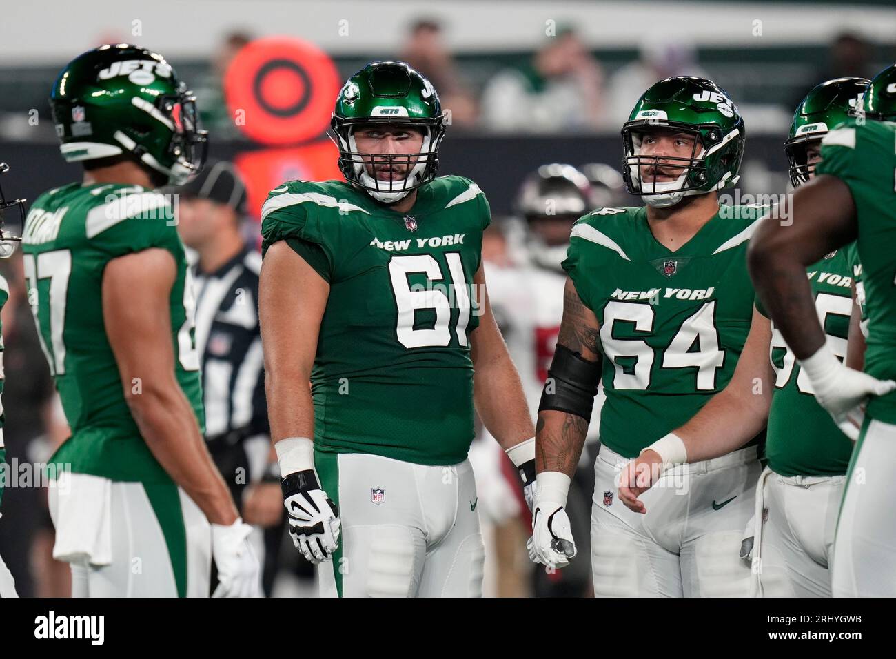 New York Jets offensive tackle Max Mitchell (61) andChris Glaser (64 ...