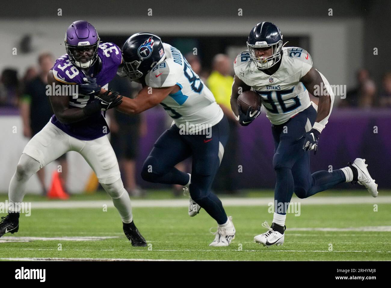 Seattle Seahawks wide receiver Matt Landers (17) scores in front of  Minnesota Vikings linebacker Abraham Beauplan (39) and cornerback Kalon  Barnes (27) during the second half of an NFL preseason football game