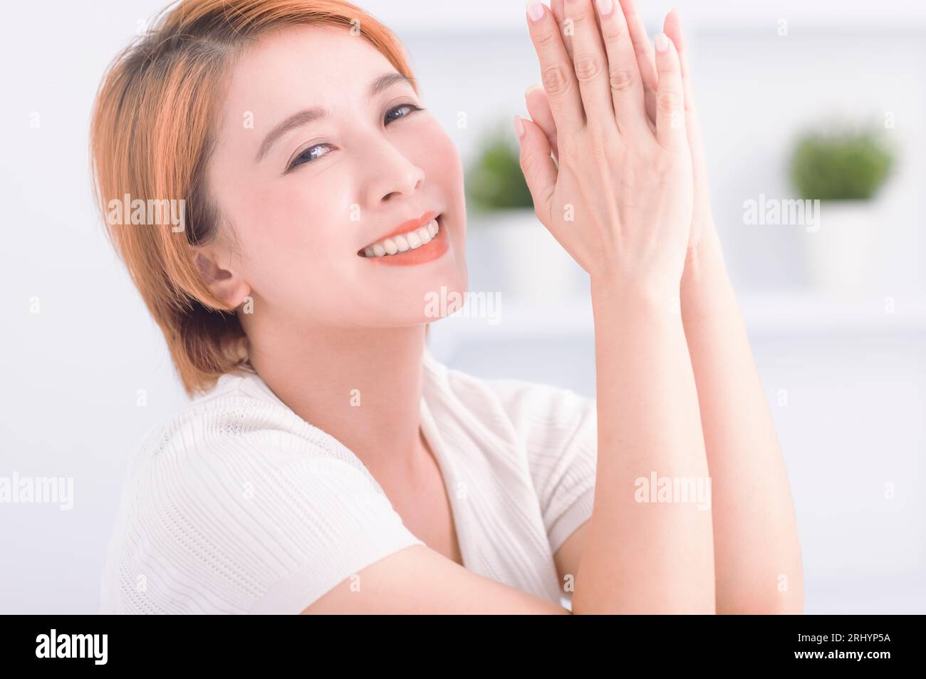 Happy thinking asian hi-res stock photography and images - Alamy