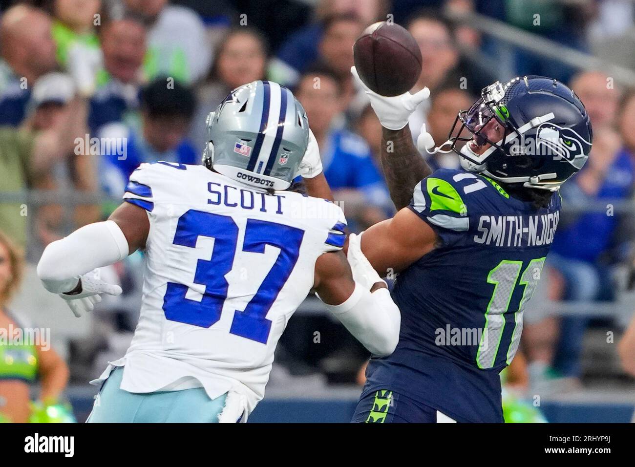 Seattle Seahawks wide receiver Jaxon SmithNjigba catches a pass in