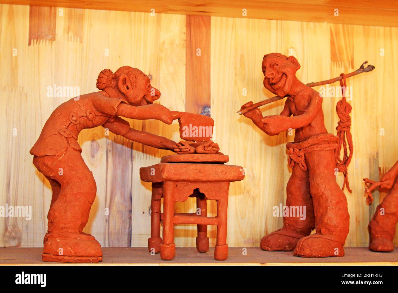 Clay figurine works by hand in a shop Stock Photo Alamy