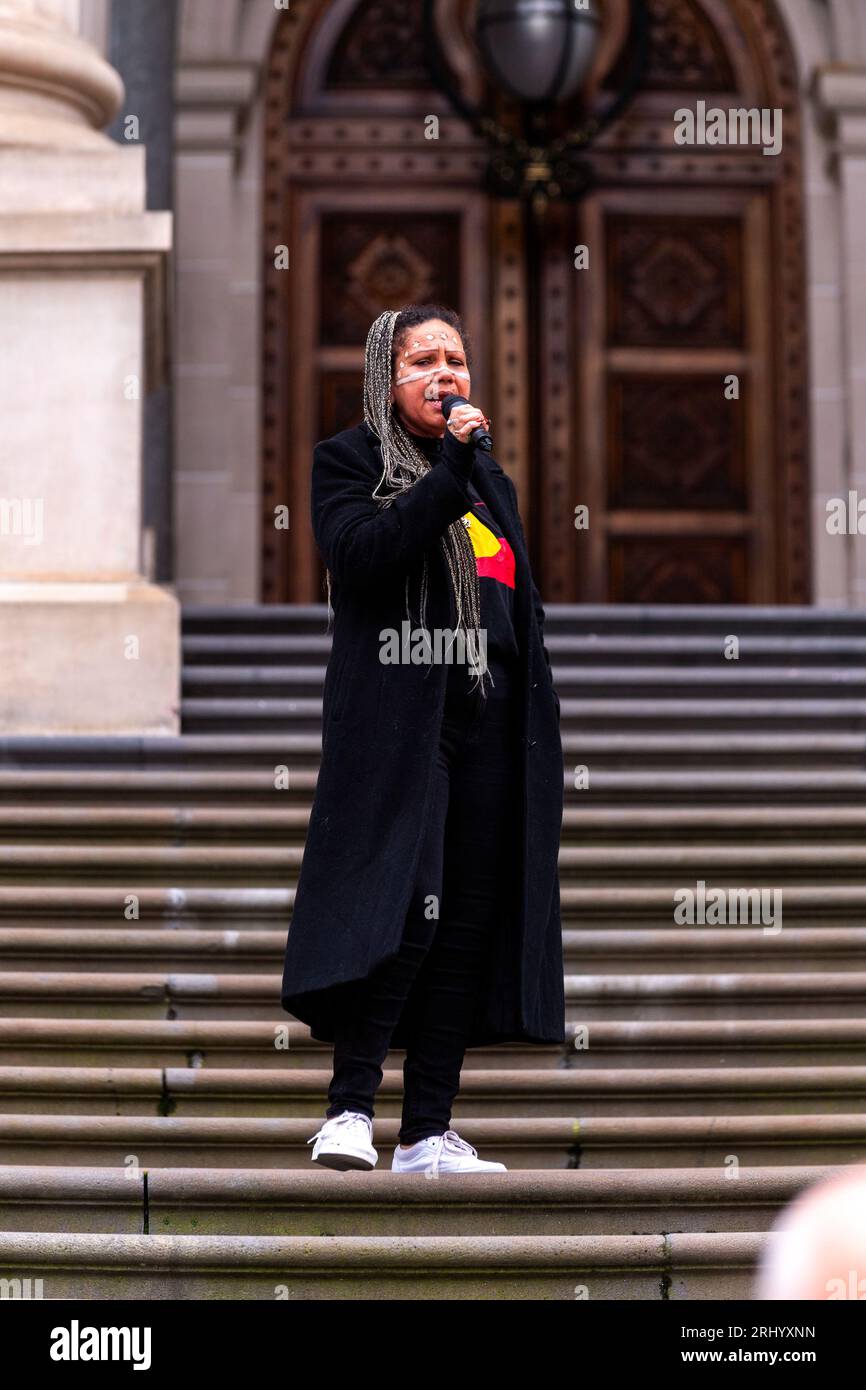 An Indigenous woman speaks to colleagues during a 'No Vote' rally on the steps of State Parliament. The Australian government will hold a referendum to change the constitution to include an indigenous 'voice to parliament'. A small group of around 30 people gathered in Melbourne at one of the first public rallies apposed to the voice. Speakers included indigenous people as well as member of fringe sovereign citizen movements and other fringe groups that emerged during the COVID-19 pandemic and lock-downs. (Photo by Michael Currie/SOPA Images/Sipa USA) Stock Photo