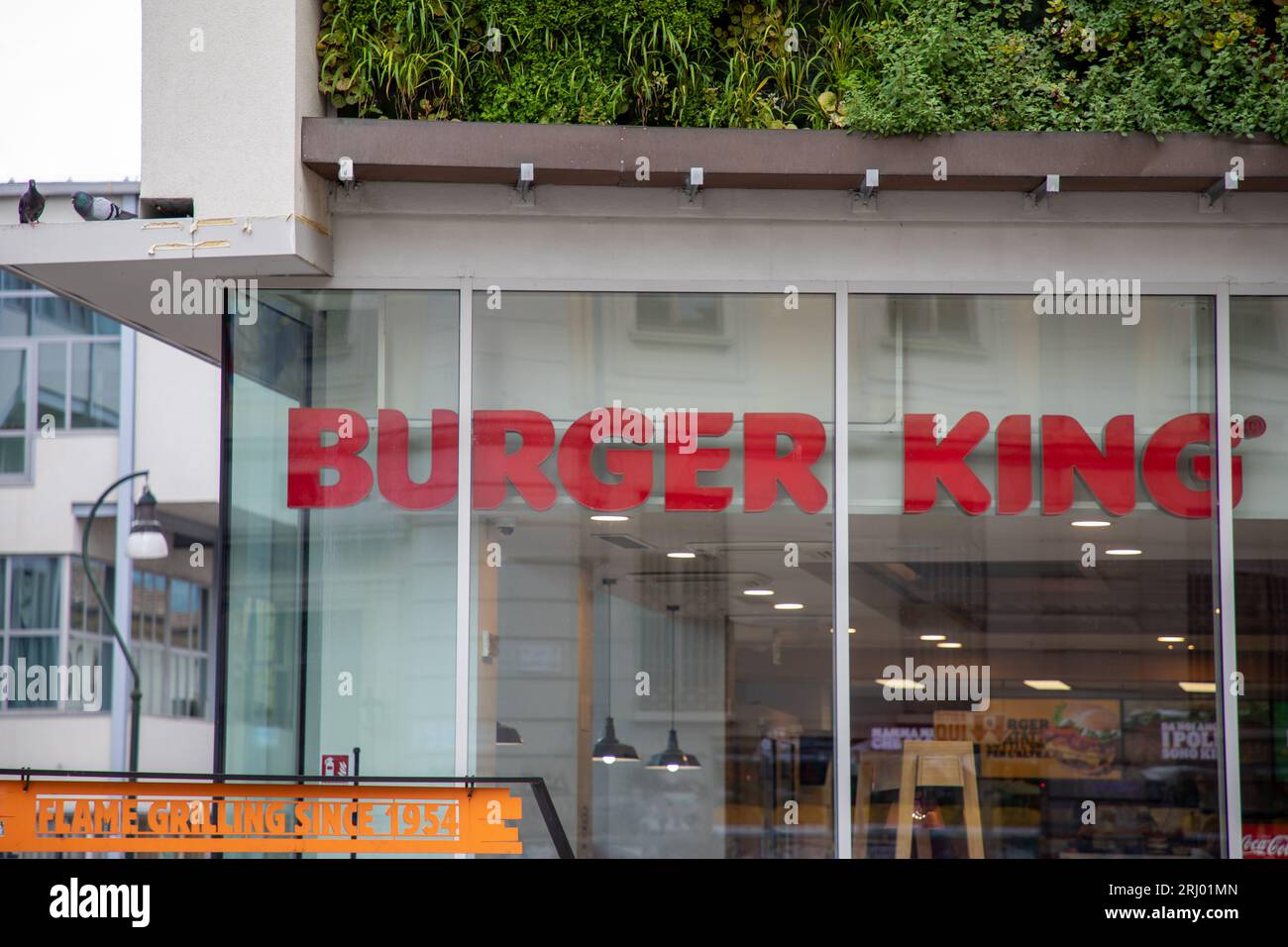 Bordeaux , France - 07 10 2023 : Burger King logo text windows entrance and brand sign wall facade shop restaurant us fast food franchise american fas Stock Photo