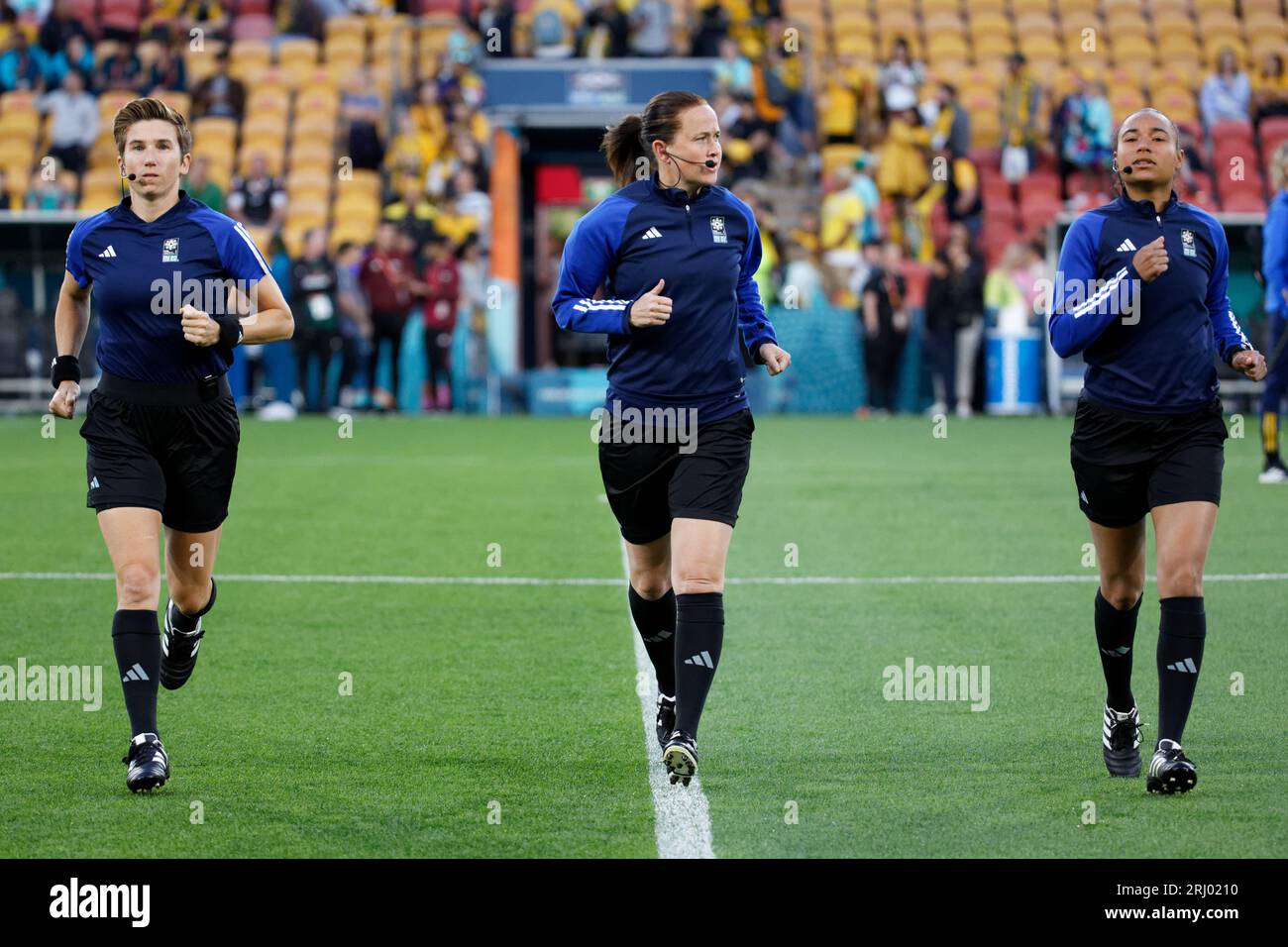 Brisbane, Australia. 19th Aug, 2023. Match referees, Michelle O'Neill, Cheryl Foster and Franca Overtoom warm up before the FIFA Women's World Cup Australia and New Zealand 2023 Third Place match between Sweden and Australia at Brisbane Stadium on August 19, 2023 in Brisbane, Australia Credit: IOIO IMAGES/Alamy Live News Stock Photo