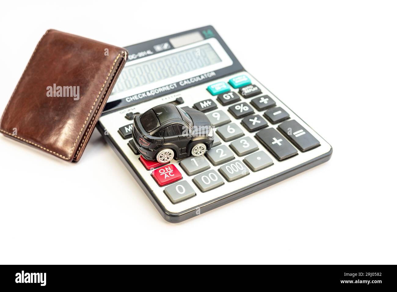 Toy car with Calculator and wallet on white isolated background. Car