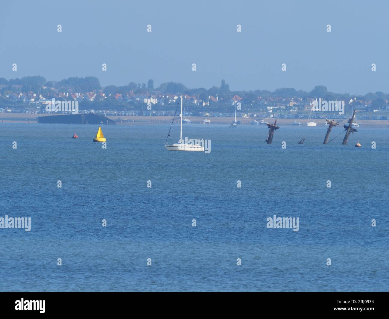As a shipwreck can be seen in the distance hi-res stock 