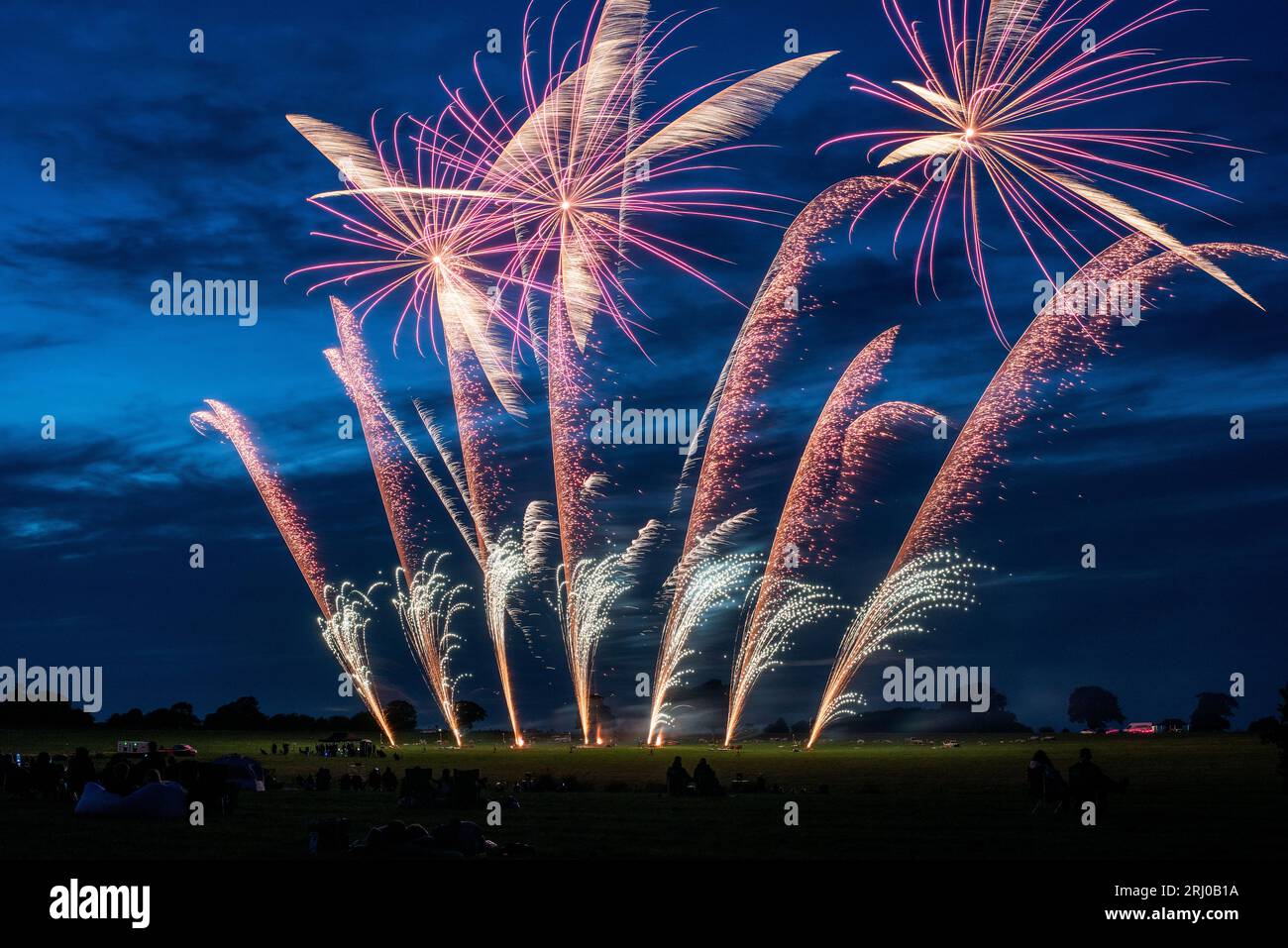 Belvoir Castle, UK. 19th Aug 2023. People watch the firework display by Flashpoint Fireworks, as three companies compete against each other for the Firework Champions title, at Belvoir Castle, Leicestershire. Neil Squires/Alamy Live News Stock Photo