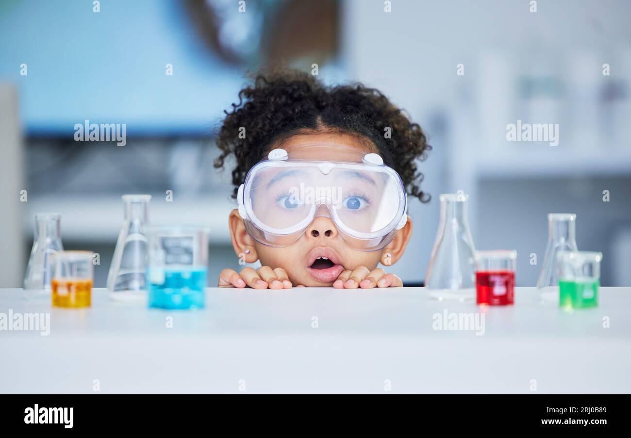Science, learning and portrait of child in laboratory for experiment ...
