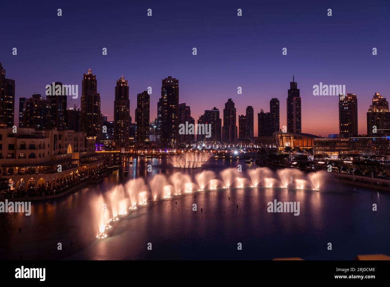 Unique view of Dubai Dancing Fountain show at night Stock Photo - Alamy