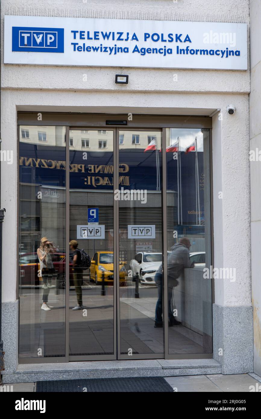 TVP - Telewizja Polska, Polish Television. Blue logo signage on the building facade. Main office entrance Poland, Warsaw - July 27, 2023. Stock Photo