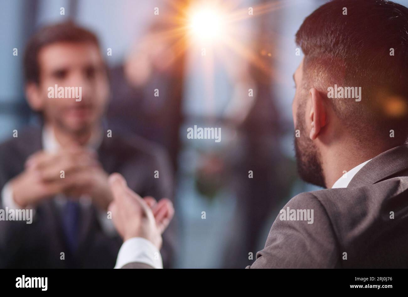 Businesspeople sitting at the table on a meeting Stock Photo