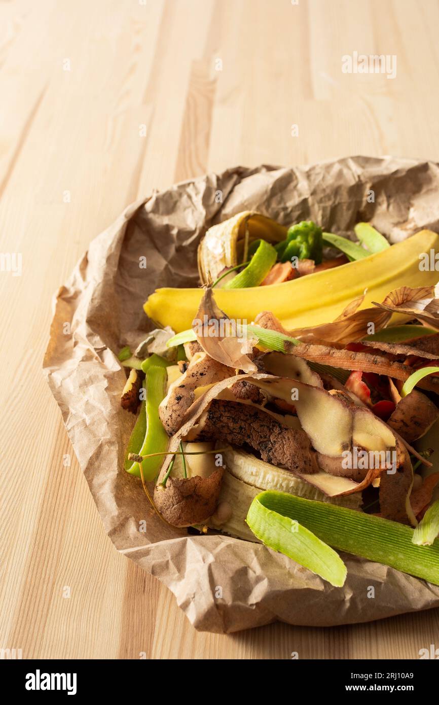 Food organic waste on eco friendly parchment paper, fruit and vegetable