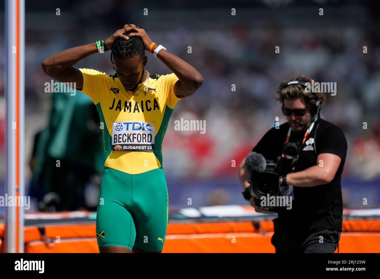 Romaine Beckford, of Jamaica, reacts after a failed attempt in the Men