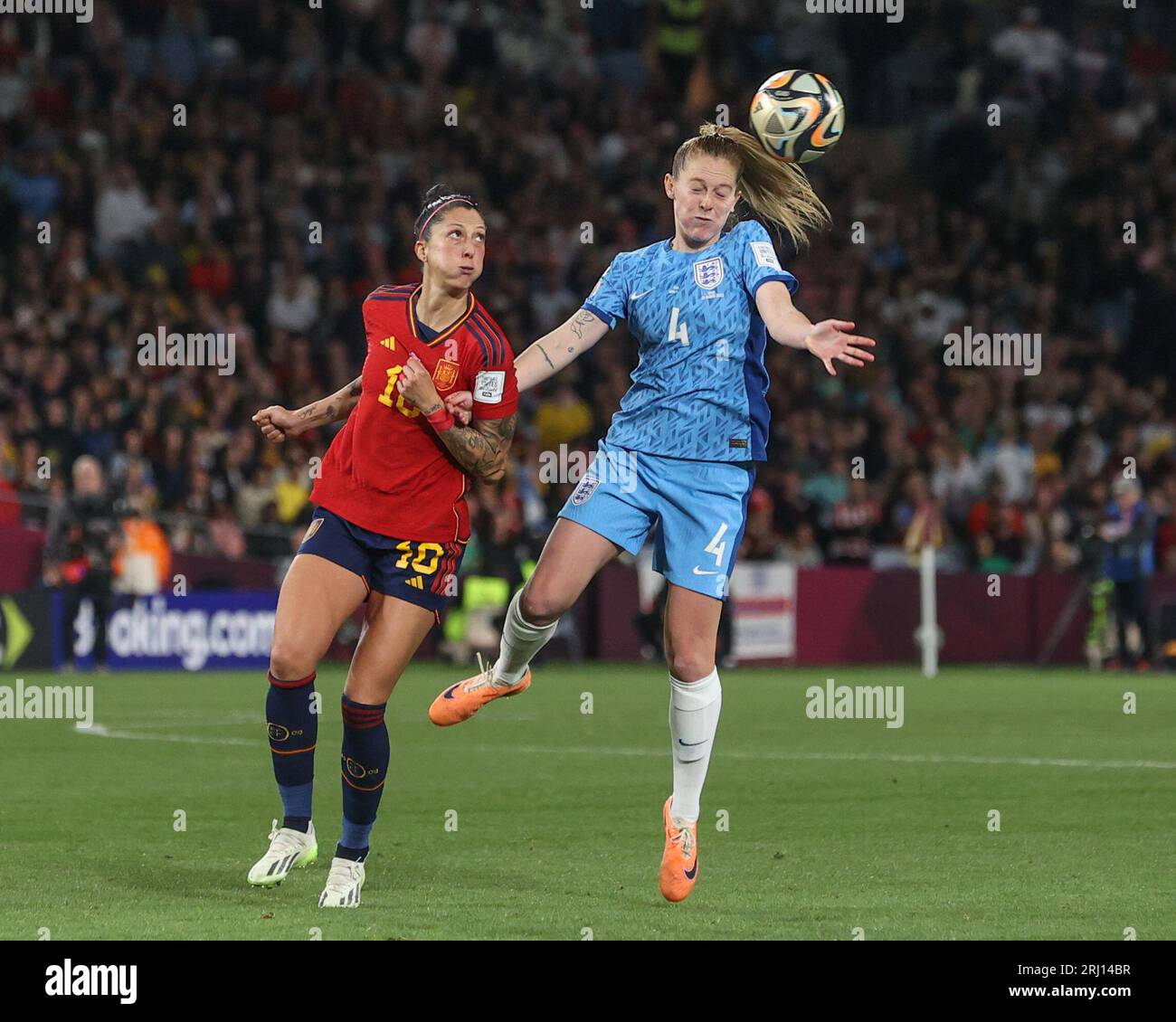 Keira Walsh #4 of England jumps up to win the high ball during the FIFA Women's World Cup 2023 Final match Spain Women vs England Women at Stadium Australia, Sydney, Australia, 20th August 2023  (Photo by Patrick Hoelscher/News Images) Stock Photo