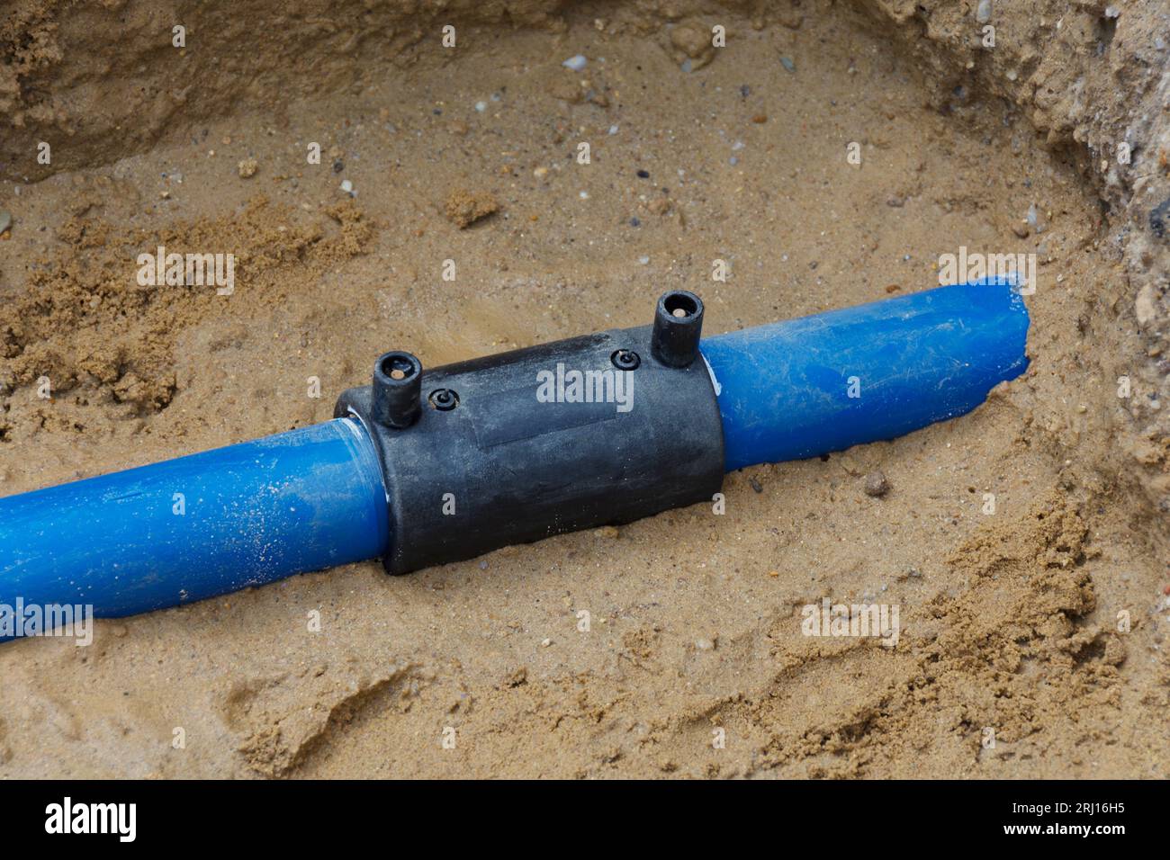 Drinking water line with connecting sleeve Stock Photo Alamy