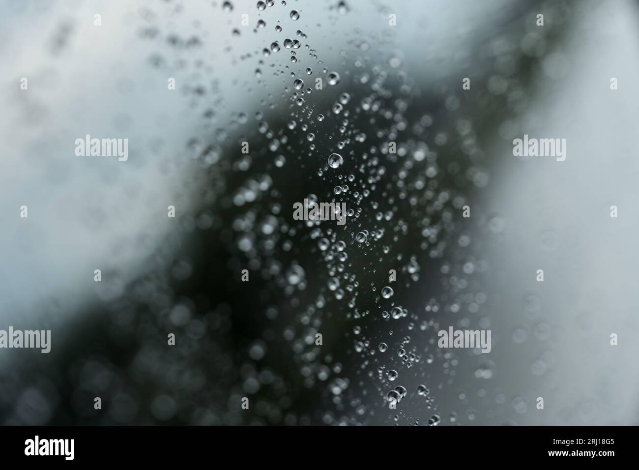 Water droplet on the car glass with hydrophobic treatment, shallow ...