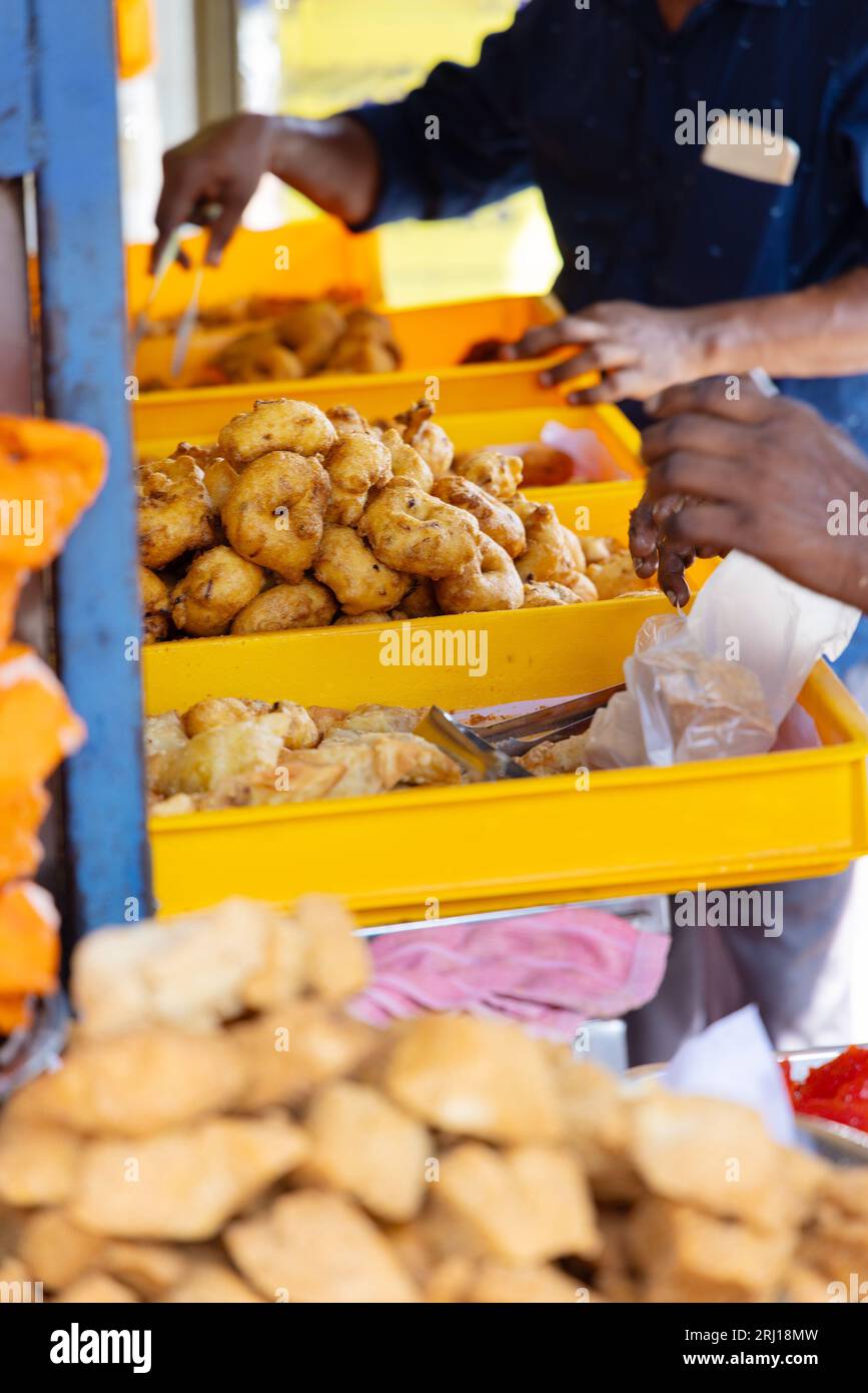 Street food vendor selling fried snacks in Asia Stock Photo - Alamy