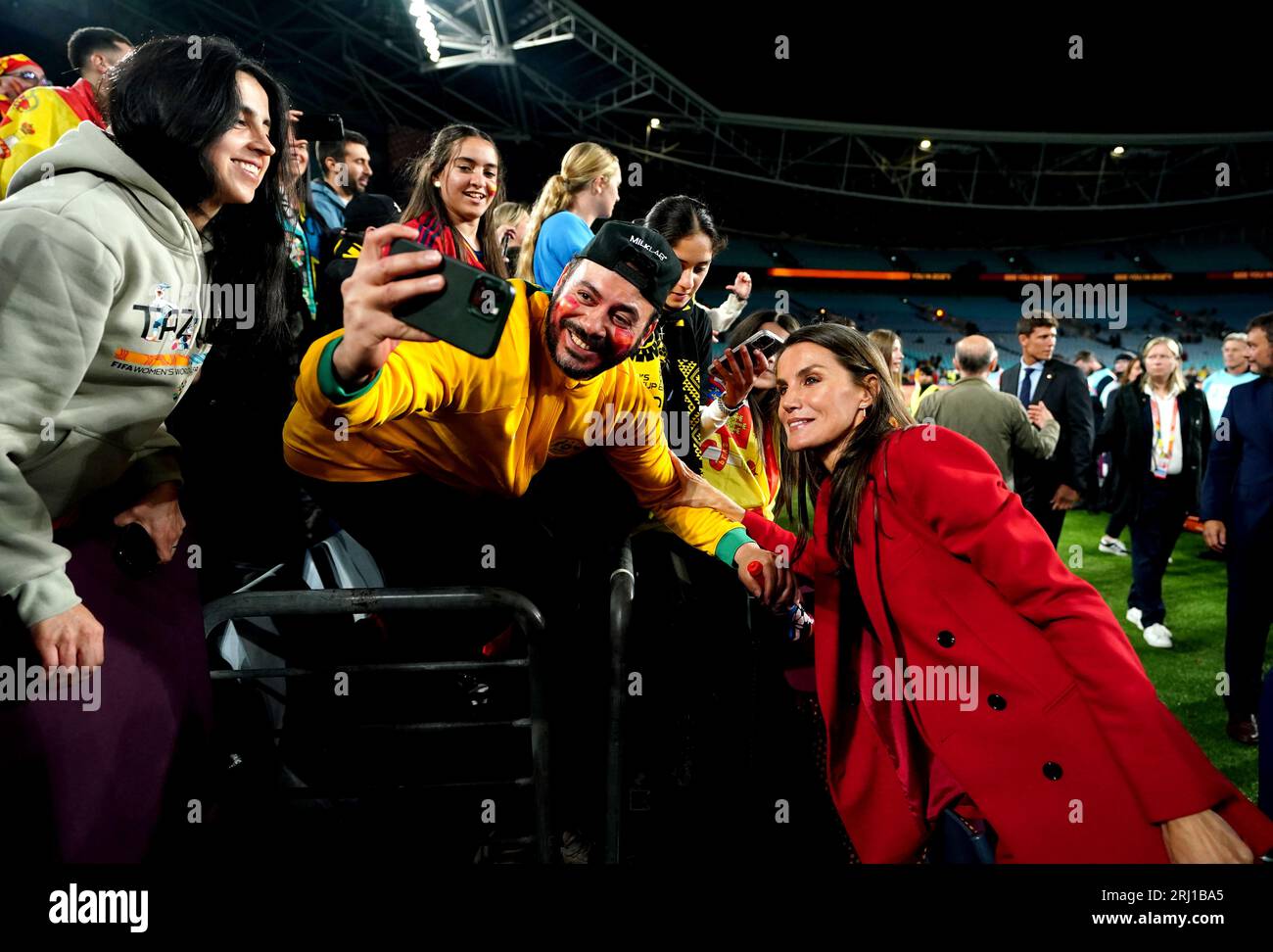 Queen Letizia of Spain poses for a photo with a fan at the end of the FIFA Women's World Cup final match at Stadium Australia, Sydney. Picture date: Sunday August 20, 2023. Stock Photo