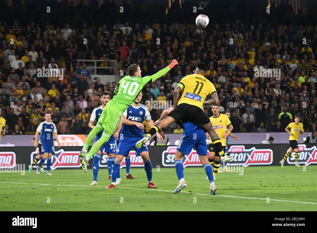 Athens, Attiki, Greece. 19th Aug, 2023. Goalkeeper Livakovic (no 40) of GNK Dinamo stops the ball in front of Araujo (no 11) of AEK. (Credit Image: © Dimitrios Karvountzis/Pacific Press via ZUMA Press Wire) EDITORIAL USAGE ONLY! Not for Commercial USAGE! Stock Photo