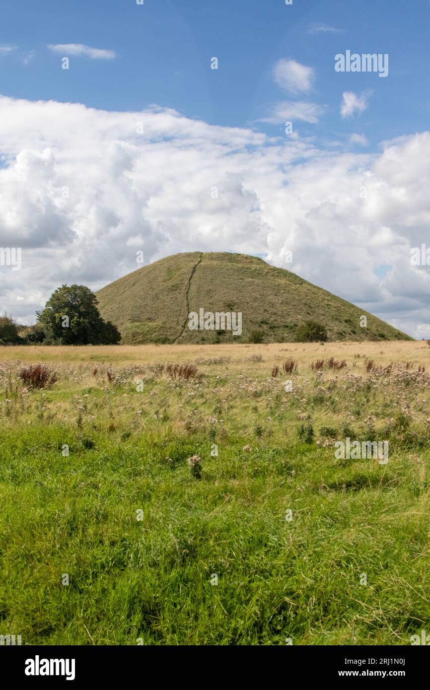 Silbury Hill a Neolithic mound, part of the Avebury Unesco World Heritage Site Stock Photo