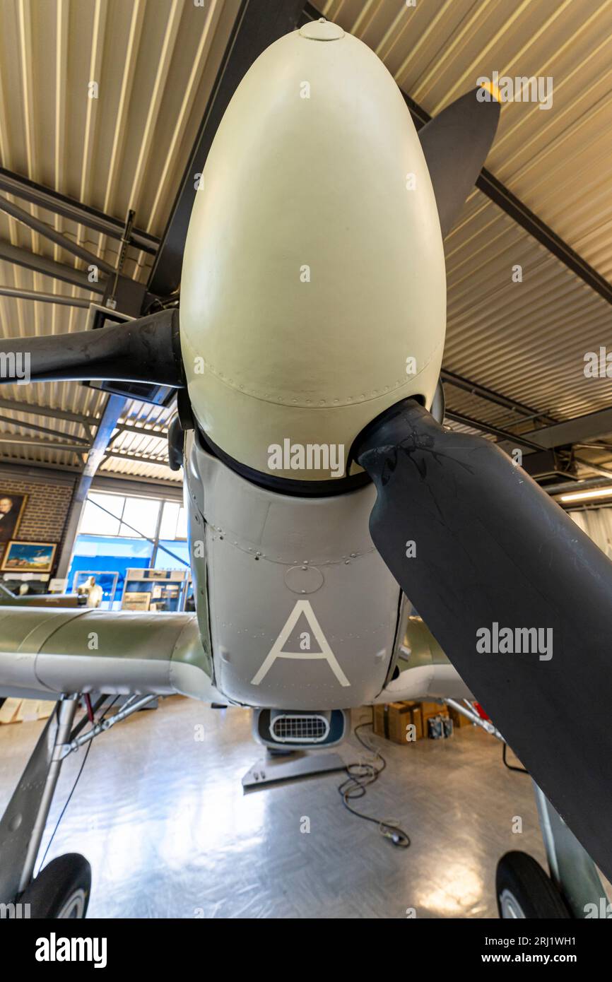 RAF Hurricane II on display inside the Spitfire and Hurricane memorial museum at the ex-RAF Manston airfield in Kent. Close up of nose and propeller. Stock Photo